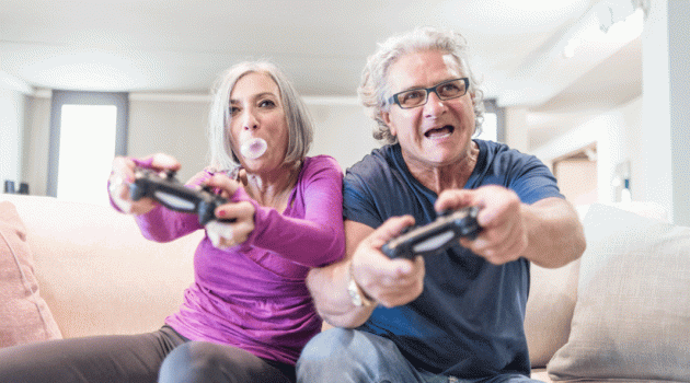 Elderly Couple Playing Video Game