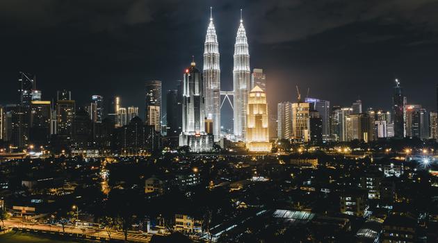 City lights with two tall buildings in Kuala Lumpur