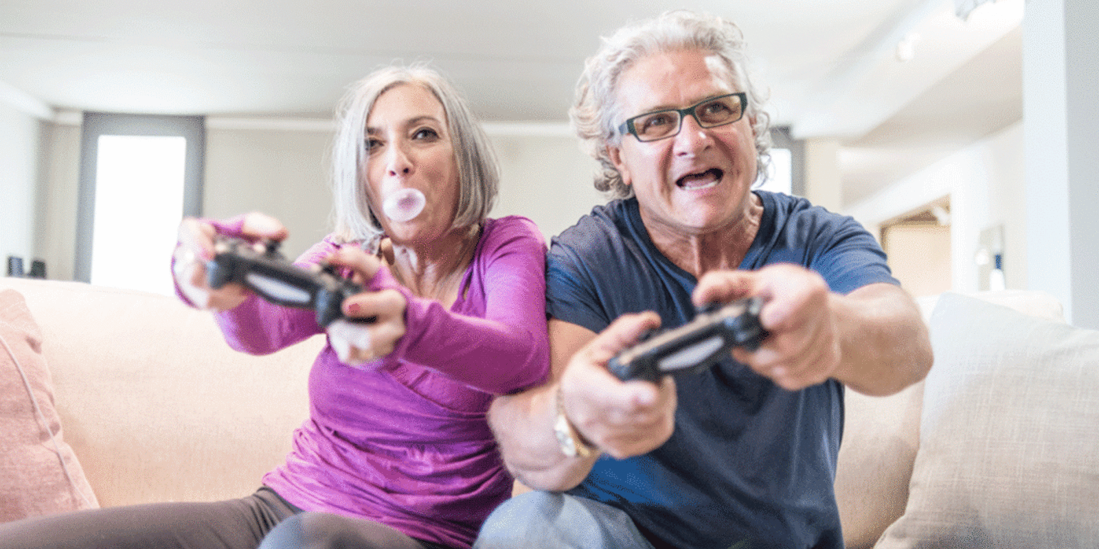 Elderly Couple Playing Video Game