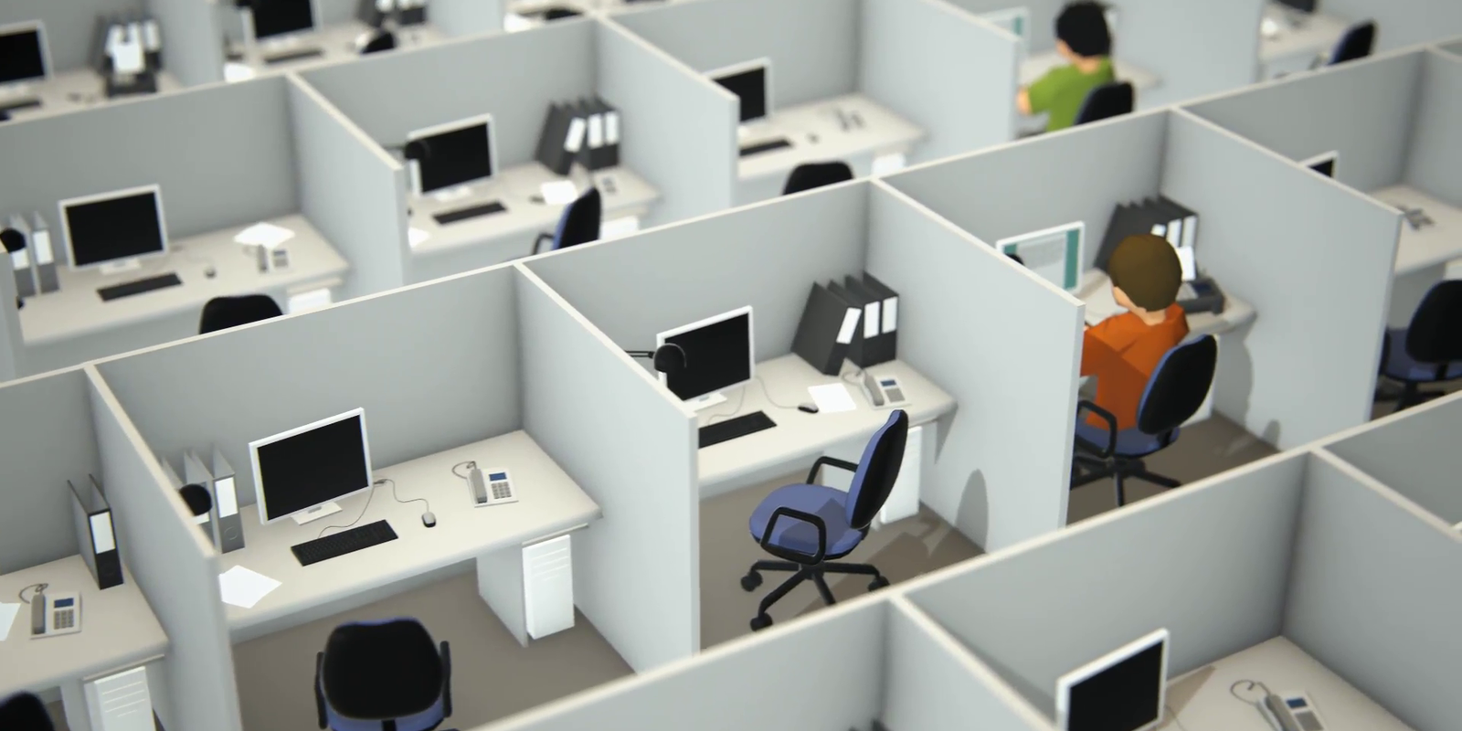 People working at desk in office cubicle