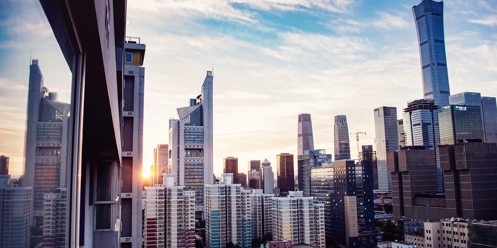 City buildings with sunset and clouds in the sky in Beijing