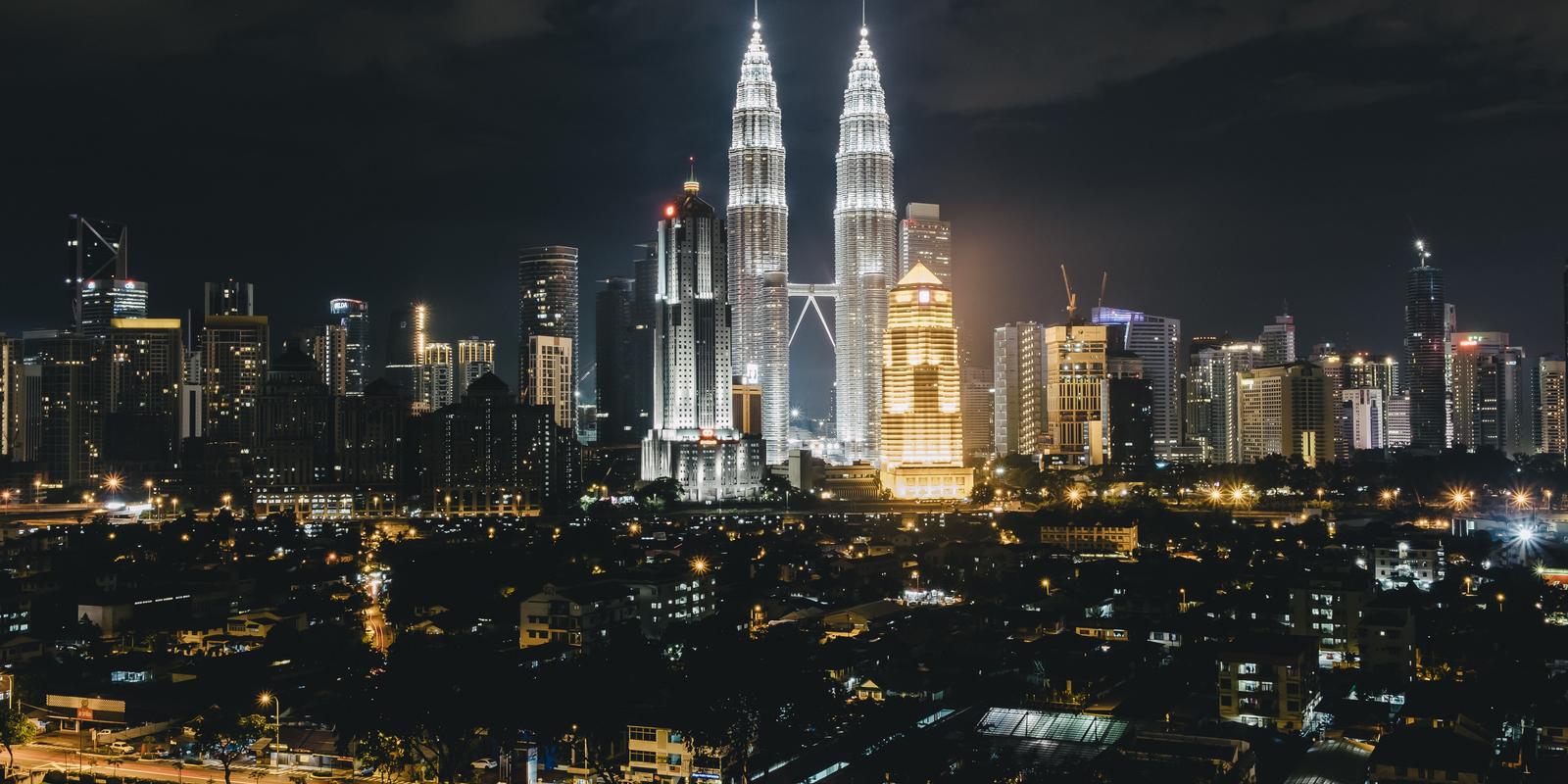 City lights with two tall buildings in Kuala Lumpur