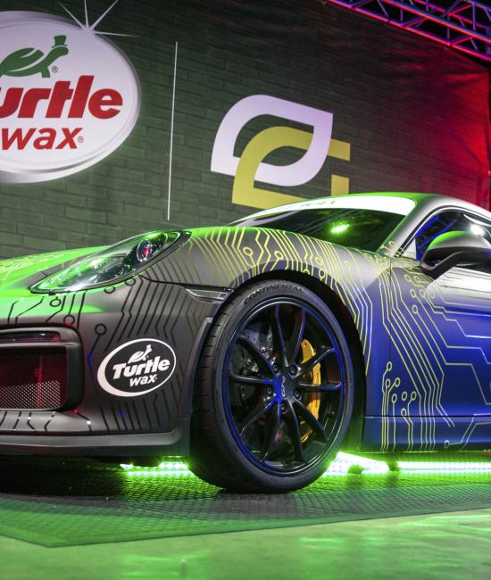 OpTic Gaming member Crimsix’s custom-wrapped Porsche on display at a tournament